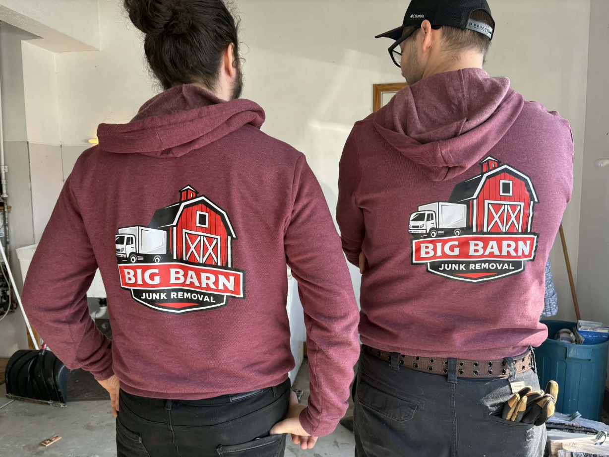 Big Barn Junk Removal crew wearing branded hoodies